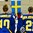 KAMLOOPS, BC - MARCH 31: Sweden's Emilia Ramboldt #10 and Erica Uden Johansson #21 look to their flag after a 2-1 win over Switzerland during preliminary round action at the 2016 IIHF Ice Hockey Women's World Championship. (Photo by Matt Zambonin/HHOF-IIHF Images)
